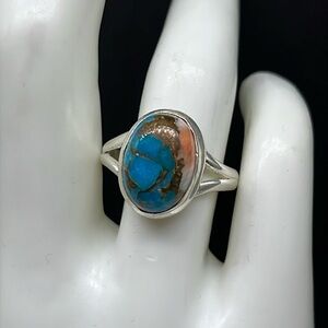 Turquoise and sterling silver split shank ring, marked 925. Size 8 1/2. 5.37 gs